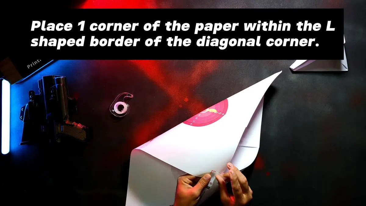 4 Page Self-Standing Target Tutorial - Tape the first diagonal corner pair